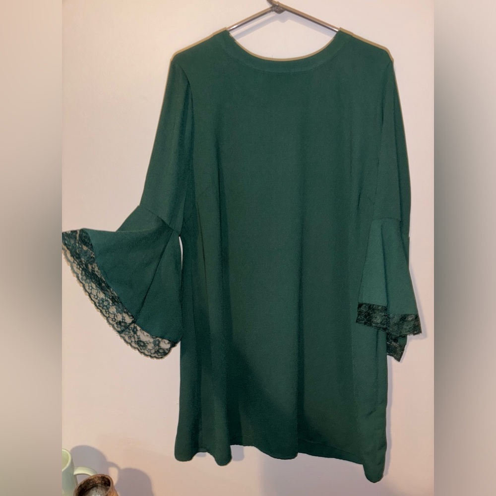Cute dress with bell bottom lace sleeves